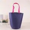 Bolsa de cubo no tejida bolsa de fondo redondo bolsa tote para ropa nueva moda bolsa tote para ropa de niños se puede personalizar LOGOTIPO