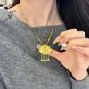 Tienda de oro Puzuo mismo estilo oro arena accesorios DIY tamaño pequeño filigrana monarca celestial estudiante borla dragón y fénix candado bolsa collar mujeres