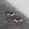 Pendientes de perlas con forma de oreja sencilla y sonrisa para mujer, nuevos pendientes de diseño de nicho para dormir, pendientes ligeros de lujo.