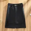 Falda de cuero PU estilo vintage para mujer, nueva colección de otoño, elegante y estilizada, falda de línea A con cinturón