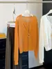 Cárdigan de punto fino de malla con cuello en V hueco, falso dos piezas, protector solar para mujer, nuevo top versátil transpirable Otoño 2026