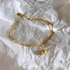 Tobillera de Cadena Pequeña con Bolas Doradas para Mujer Verano Versátil Llamativa Cadena para el Pie Sexy Personalidad Diseño de Nicho Regalo