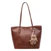 Bolso de mujer de gran capacidad retro 2026 nueva moda versátil para el antebrazo bolsa de mensajero simple casual bolso de hombro tote