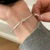 Pulsera de Lazo para Mujer, Lujo Ligero, Gama Alta, Pulsera Hueca Dulce, Moderna y Versátil, Cadena de Hueso de Serpiente Fresca