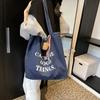 Casual Fashion Denim Tote Bag 2024 Outono e Inverno Nova Vintage Niche Letter Bolsa de Ombro Simples Bolsa de Axila