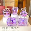 Muñeca de Gato Kt de Dibujos Animados con Arena Líquida en una Botella Venta al por Mayor Decoración Creativa para Escritorio Llavero Acrílico Colgante Pequeño Accesorio