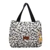 Bolsa de almuerzo portátil de moda Transfronteriza Nueva Bolso de mano casual para viajes Versión coreana para mujer Bolso de lona versátil y moderno