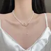 Collar de Perlas de Alta Gama Francés Camelia Lazo Doble Borla Cadena para Clavícula Vintage Todo Fósforo Cadena de Collar Exquisita