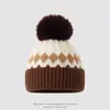 Gorro de punto jacquard estilo americano transfronterizo, gorro de pompón protector para orejas estilo coreano para niños mayores, gorro de lana cálido para niños de comercio exterior