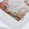 Lujo ligero europeo y americano minimalista cadena de metal de alta gama para ropa y bolsos herrajes hebilla decorativa conector de pecho para bikini