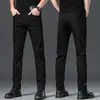 Jeans negros de alta gama, resistentes al color, para hombre, nueva colección primavera/otoño, corte recto, ajuste slim, elásticos, tobillo cónico, pantalón largo casual, estilo moderno