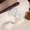 Anillo trenzado de cuentas entrelazadas plateadas vintage nuevo para mujer, diseño de nicho, anillo para el dedo índice, anillo único de alta gama