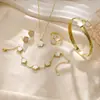Set de Joyería de Trébol de Cinco Hojas de la Suerte Más Vendido en Europa y América Pulsera de Acrílico Pulsera Collar de Trébol de Cinco Hojas Anillo Pendientes para Mujeres
