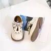 Sapatos Femininos Sapatos de Princesa 2025 Primavera e Outono Novos Sapatos Pequenos de Couro Infantis Laço Doce Menina Pequena Sola Macia Sapatos Tipo Feijão