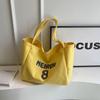 Nova Bolsa de Lona com Estampa de Letras para Mulheres Verão 2026, Design Exclusivo, Bolsa de Ombro de Grande Capacidade, Bolsa Tote Estilo Relaxado