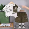 Conjunto de Verano para Niños 2026 Nuevo Elegante Camisa Estampada con Letras de Manga Corta y Pantalones Cortos Conjunto de Dos Piezas para Niños Pequeños y Niños