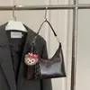 Bolso de Hombro Retro Coreano con Forma de Media Luna 2025 Invierno Estética Personalizada Diseño Simple de Nicho Bolso de Hombro Cruzado