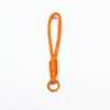 Llavero de cordón para teléfono móvil de moda, bloque de color, funda de teléfono, cuerda anticaída, tejido a mano de malla, versátil, colgante de cuerda para taza de agua