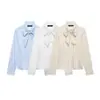 Falda corta de nueve puntos y camisa a rayas para mujer, estilo europeo y americano transfronterizo, nueva, moderna y elegante, 2026, con detalle de lazo 4387260