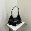Bolsa feminina de grande capacidade, nova coleção outono 2026, bolsa de ombro estilosa e minimalista de nicho estilo coreano, bolsa de ombro casual de cor sólida