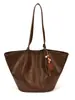 Bolsa de mano grande transfronteriza para mujer, nueva moda otoño 2026, bolso de hombro, elegante y versátil para el trabajo y los desplazamientos