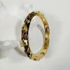 Yongge Jewelry Pulsera de Esmalte Transfronteriza Europea y Americana para Mujer Moderna Colorida Geométrica Rayada de Puntos Filigrana con Borde Dorado Accesorio de Mano