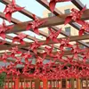 Suministros de boda diseño de patio color molino de viento decoración exterior linternas rústicas habitación de boda molino de viento de flores