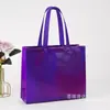 Bolsa de tela no tejida con láser para compras, bolsa de regalo publicitaria, bolso de mano tridimensional termosellado ultrasónico en stock, logotipo impreso