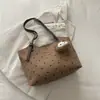 Bolso de mujer transfronterizo de gran capacidad, nueva colección otoño 2026, bolso de hombro versátil y a la moda, bolso tote moderno y casual para el trabajo y el uso diario