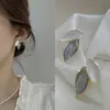 Brincos de flor de pérola coreanos estilo TikTok para mulheres, luxo leve, alta qualidade, nicho, versáteis, elegantes, brincos populares