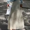 5% seda de morera, 5% cachemira, 90% lana de oveja, Fábrica de Tejidos Puyuan, falda larga de punto versátil estilo coreano con diseño cepillado de lana