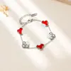 Pulsera de Acero de Titanio Incrustada con Diamantes de Venta Caliente Transfronteriza, Trébol de Cuatro Hojas, Acero Inoxidable, Lujo Ligero, Joyería Popular Europea y Americana a la Moda