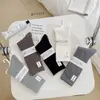 Nuevos Calcetines de Lana Gruesos y Cálidos para Hombre y Mujer Serie de Algodón de Doble Aguja Vertical Estilo Académico Estudiante Cachemir de Tubo Largo