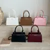 Bolsa de Mão Casual Estilo Coreano para Mulheres 2026 Nova Bolsa Quadrada Pequena Elegante e Estilosa Bolsa Transversal Texturizada com Design Único