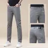 Jeans masculino azul escuro de marca italiana de luxo, elástico, corte slim, versátil, casual, calça skinny, nova coleção de outono