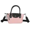 Nuevo bolso mini de patchwork de nailon de alta gama 2026 para mujer, bolso de mano de hombro cruzado moderno y versátil, bolsa de regalo