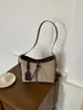 Moda transfronteriza exquisita versátil simple estilo commuter bolso de hombro cruzado individual nuevo 2026 bolso tote para mujer