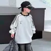 Sudadera para niño primavera y otoño 2026 modelo nuevo, ropa de otoño para niños mayores, top holgado elegante y genial estilo callejero para niños