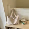 Bolsa de tela de mano de gran capacidad para el trabajo Bolsa de mujer 2026 Verano Nuevo Bolso de hombro único informal Bolso tipo tote simple y ligero