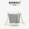 Nuevo Bolso Cubo de Moda de Gama Alta para Mujer, Comercio Exterior Transfronterizo, Elegante Bolso Cruzado con Monograma D