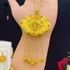 Tienda de oro con accesorios antiguos de oro DIY ahuecados seda incrustada disco imperial dragón y fénix borla candado bolsa al por mayor