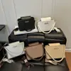 Bolso Versátil para Mujer 2026 Estilo Nuevo Elegante Gran Capacidad Cruzado al Hombro Pequeño Tipo Cubo Bolso con Sensación Casual