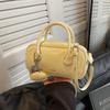 Bolsa de Mão Bowling Texturizada de Alto Padrão Transfronteiriça Tendência para Mulheres 2025 Novo Estilo Coreano Moda Nicho Bolsa de Ombro Único Transversal