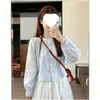 Camisa de Manga Larga Rayada Corta Estilo Nuevo 2026 para Mujer, Estilo Academia, Top Holgado y Adelgazante, Camisa de Muñeca, Mujer