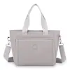 Bolso de mujer de nicho de lujo ligero, bolso cruzado de gran capacidad para ir al trabajo, bolso de hombro y cruzado de nailon