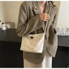 Bolso de Mujer 2026 Estilo Nuevo Bolso de Mano de Gama Alta Sencillo y Elegante Bolso Cuadrado Pequeño Diagonal para Ropa de Trabajo Diaria Bolso Tote de Exportación