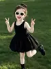 Vestido Negro sin Mangas de Botón para Niña 2026 Modelo Nuevo con Espalda Cruzada Calada Vestido Pomposo Vestido de Tirantes de Princesa