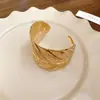 Pulsera de Apertura de Camino con Patrón de Hoja Metálica Pulsera Transfronteriza de Lujo Ligero de Alto Nivel Pulsera de Personalidad Exagerada Europea y Americana para Mujer Venta al por Mayor
