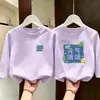 Camiseta Infantil de Manga Longa 100% Algodão Top Infantil Coleção Outono 2026 Tamanho Médio a Grande Infantil Casual Gola Redonda Camiseta Versátil para Usar por Baixo
