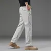 Pantalones casuales de alta gama para hombre de Hong Kong, nuevo estilo otoño 2026, pantalones rectos holgados elásticos para hombres de mediana edad